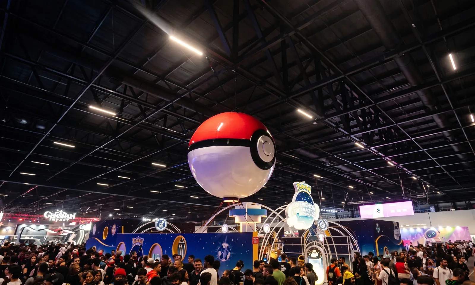 POKEMON — The giant Poké Ball over the fair, the crowd below